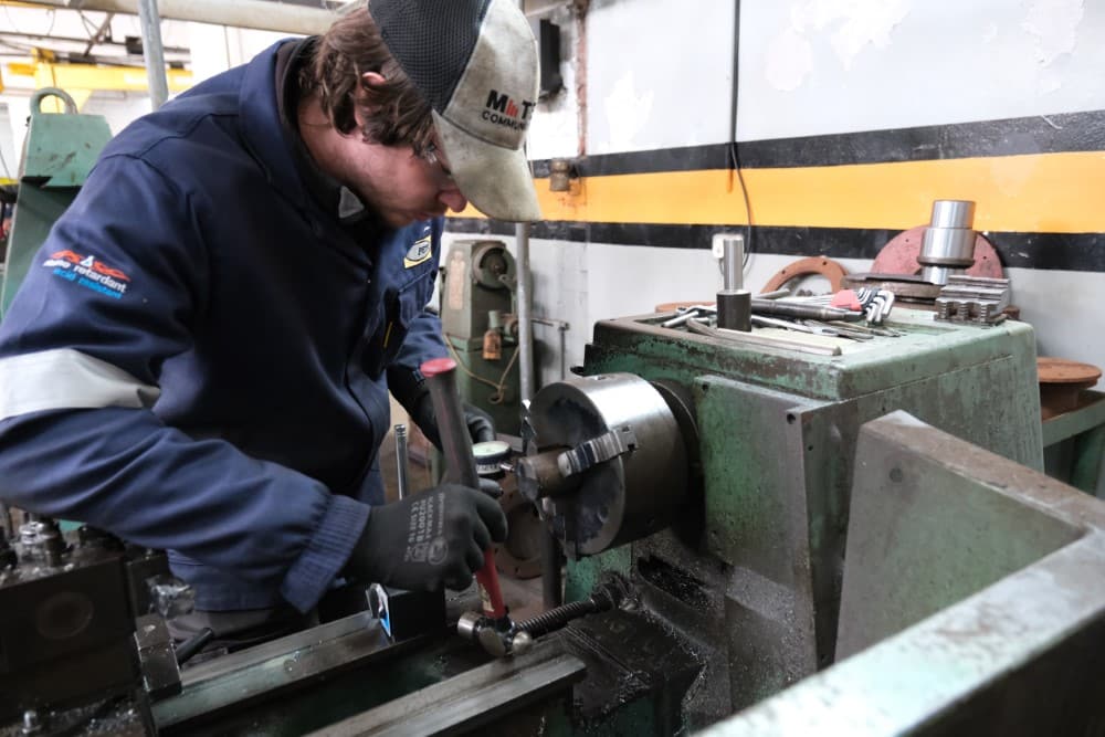 PETEC marine engineer inspecting hydraulic equipment