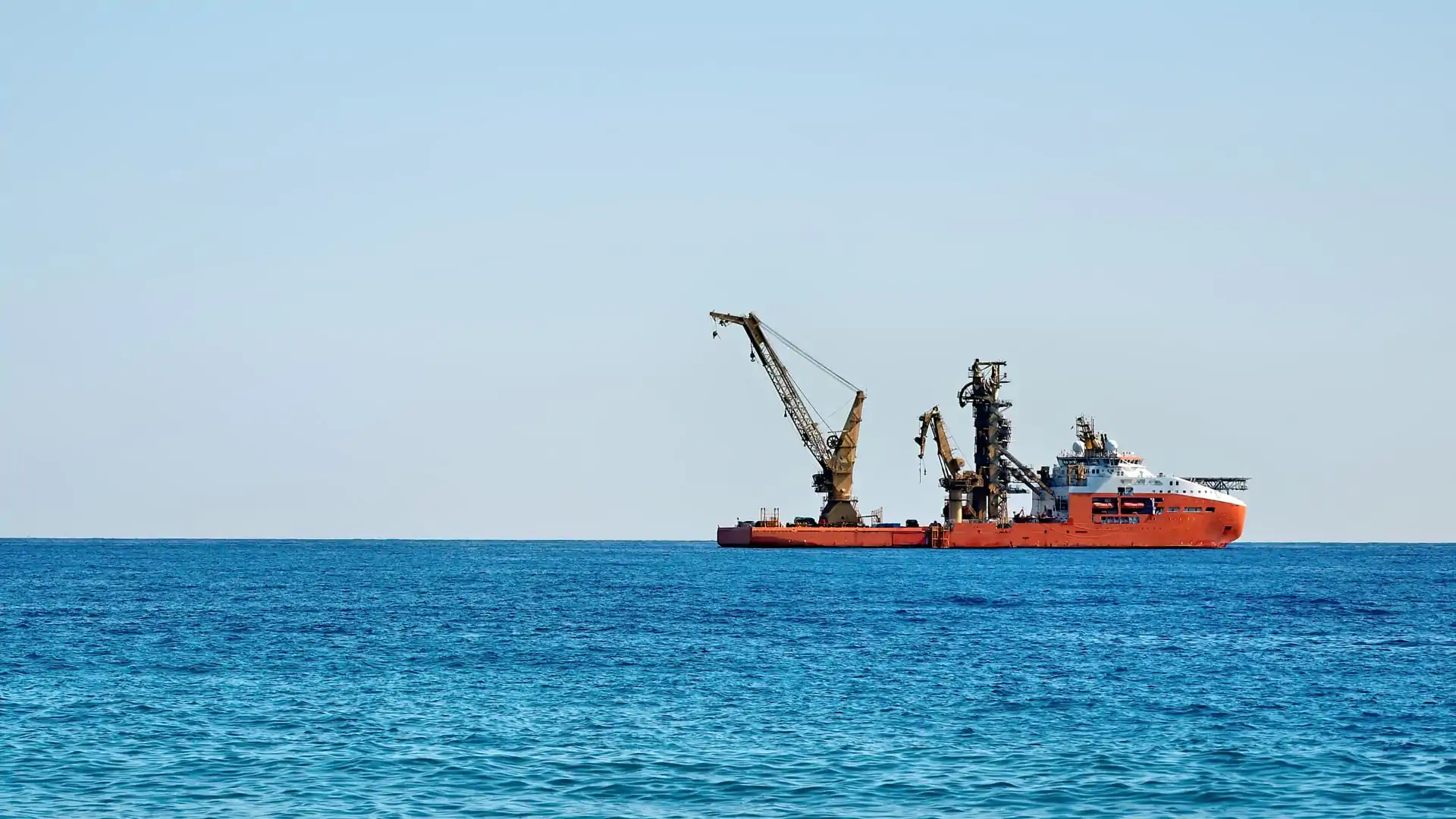 Working ship sailing near the coast of Cyprus